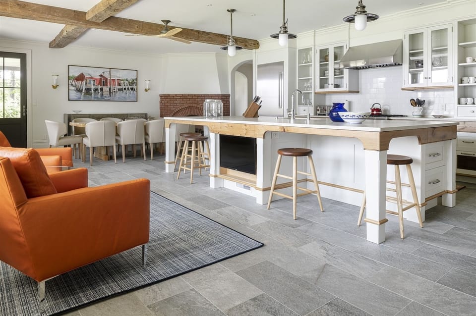 The kitchen area in the great room looking into the dining room.
