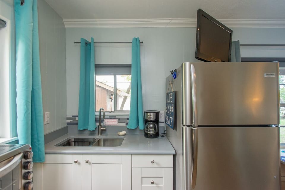 This cabin makes great use of space giving you a fully functioning kitchen.