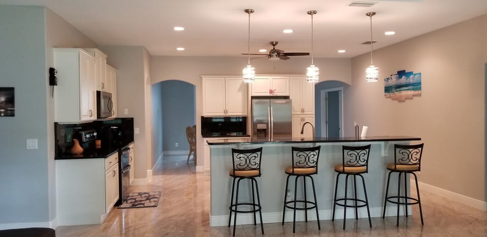 kitchen and Bar open to living room