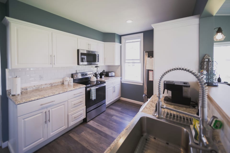 Bright kitchen with all amenities needed for cooking 