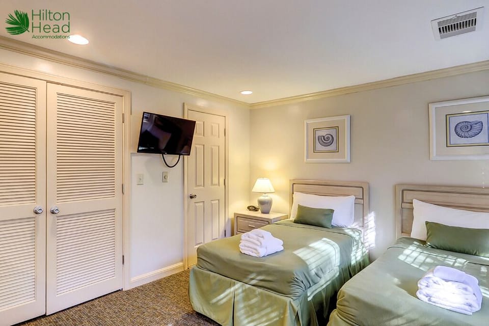 Settle in with in-room TV and generous storage for longer stays.