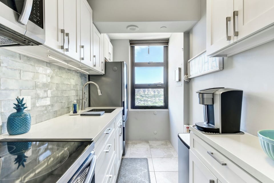 Fully equipped kitchen with stainless  appliances and Keurig coffee maker