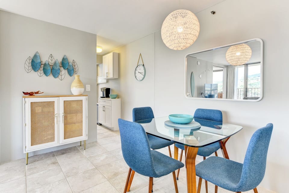 Dining area leads into a newly renovated galley kitchen