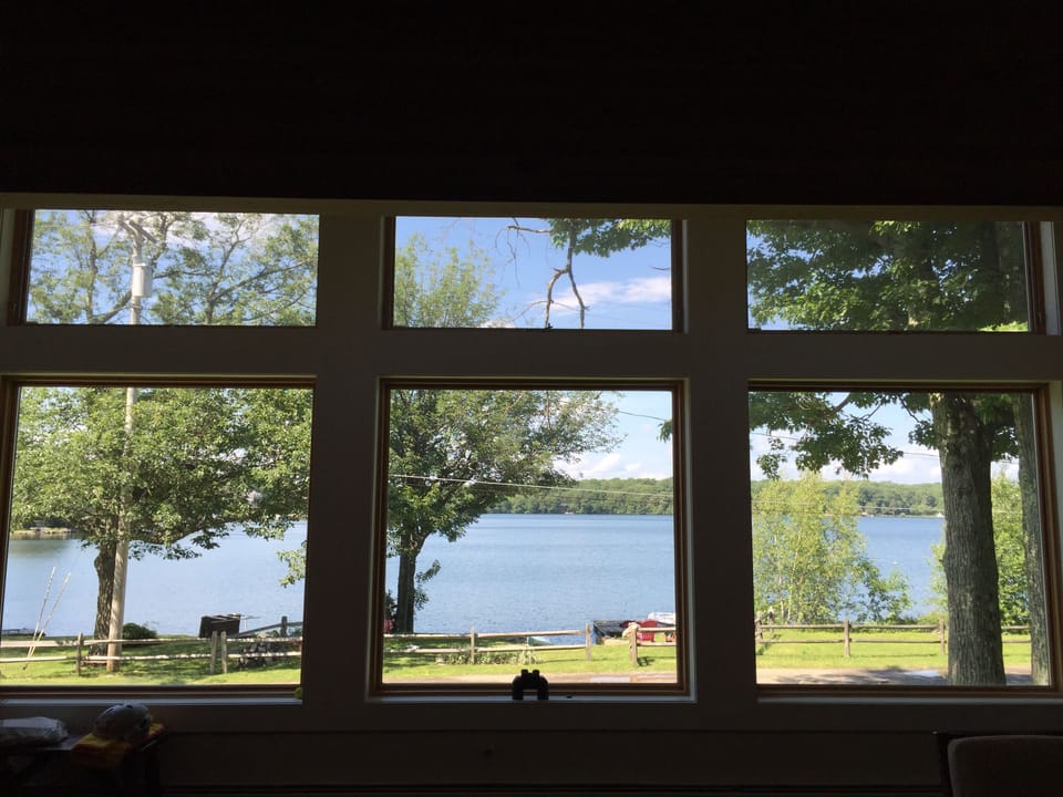 dining/living room wall of windows to enjoy the view and the air conditioning