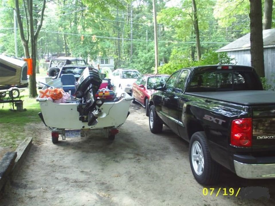 parking 2 wide 3 deep. 
on left we have a jeep then my suv with boat.