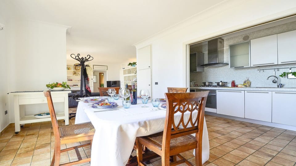 Dining/living area and kitchen at Villa Amolu close to Amalfi Coast and Sorrento