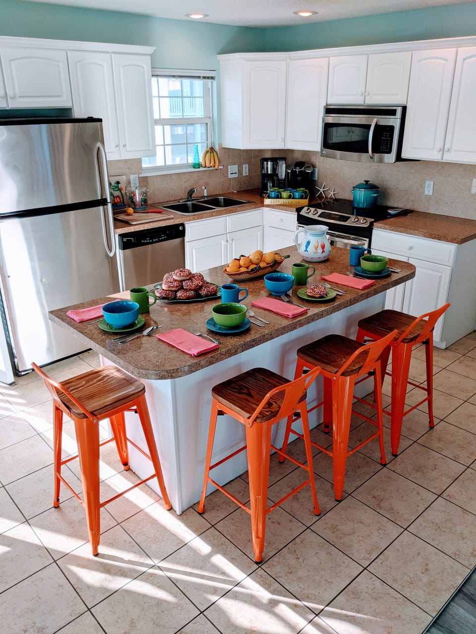 Fully stocked kitchen, spacious prep area and island