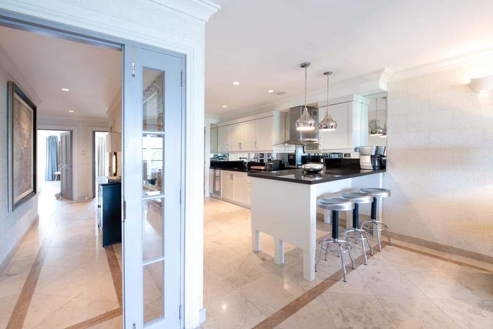 Spacious hall way leading from living area to bedrooms