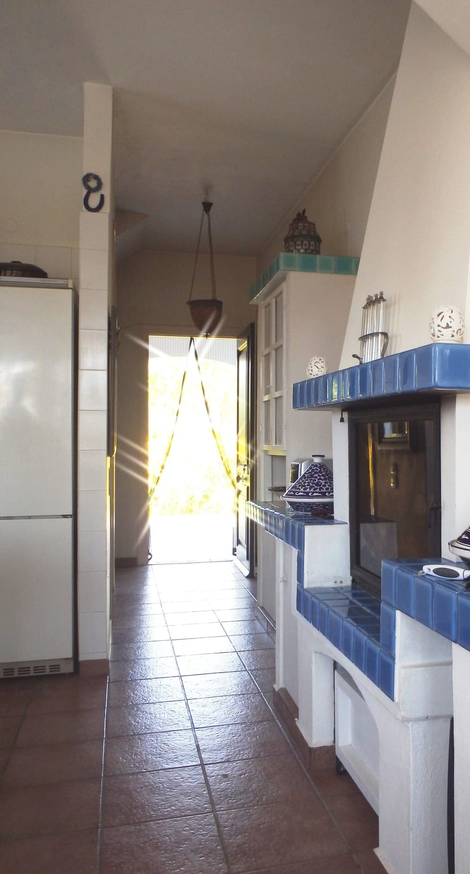 Way out from the kitchen area to the back yard veranda