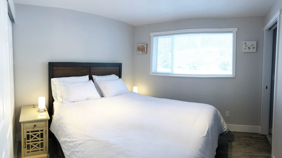 relax on the queen-size bed with memory foam pillows.