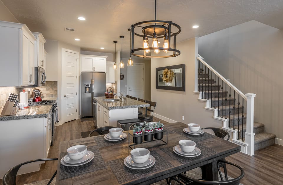 Dining Table - With an open and spacious floor plan, the Dining Room and Kitchen can accommodate meal preparations for groups large or small.