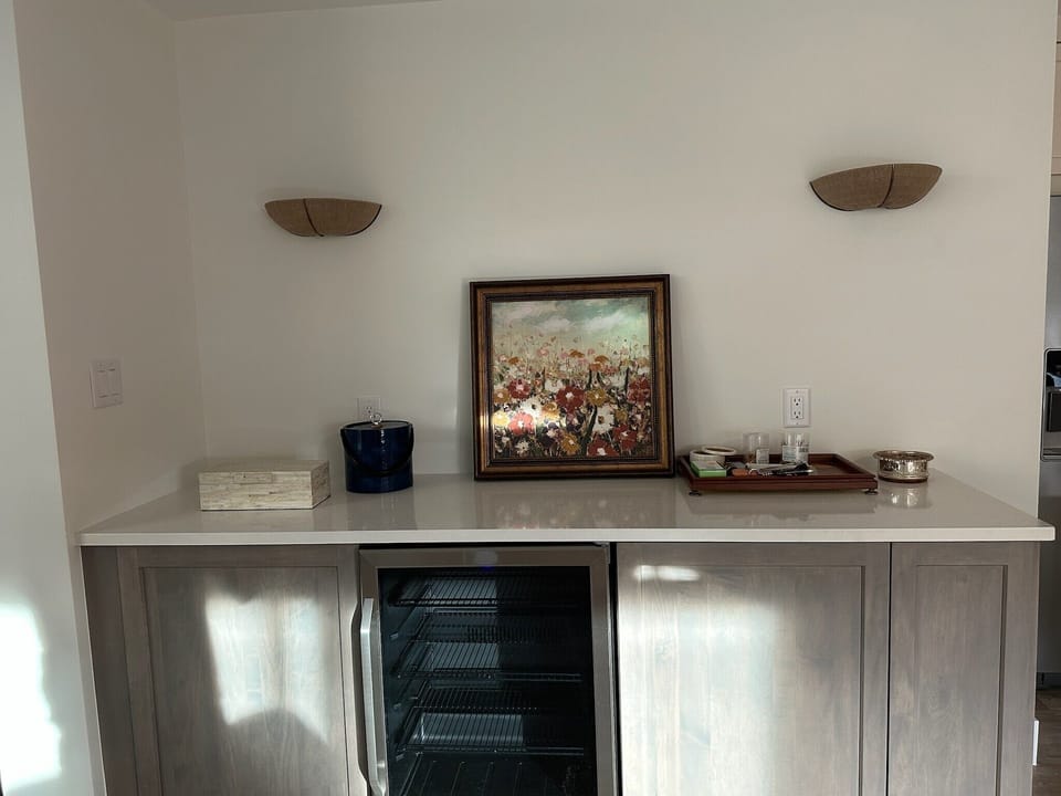 Buffet/Dry Bar with beverage refrigerator.