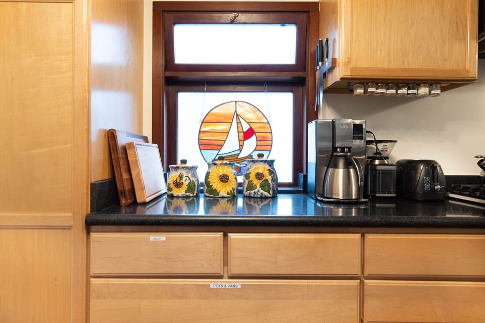 Left Kitchen Window with Appliances and Sharp Knives 