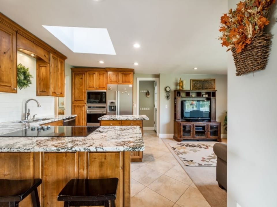 Kitchen and adjoining TV room