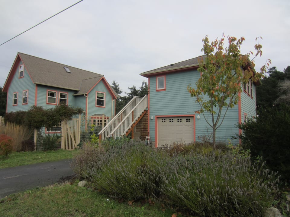 Froggy Bottoms Studio above garage.  Owners' house to left.