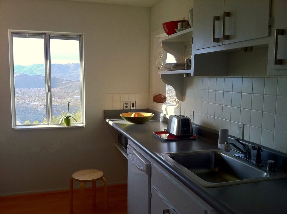 Kitchen with a view equipped with every convenience you may need