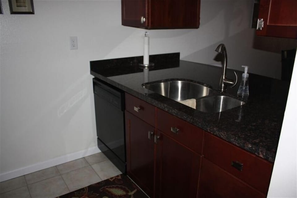 New kitchen with granite counter tops.