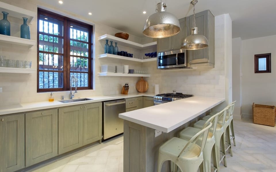 Fully Equipped Kitchen with Stainless Appliances and Quartz Countertops