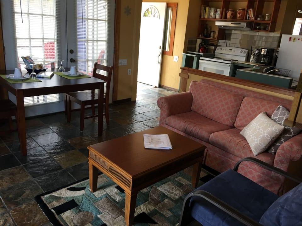 dining and living area with flat TV and Stereo Radio 
all room has ceiling fans 