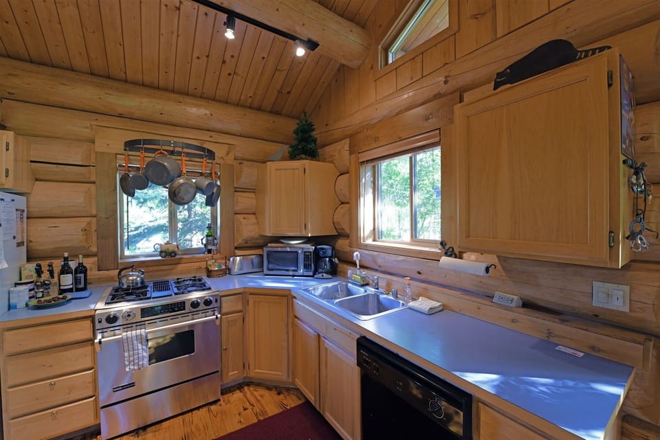 One bedroom is the main floor of the log townhome.