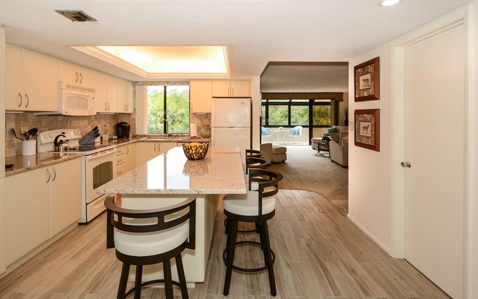 Kitchen open to the Dining room, Living room and Lanai