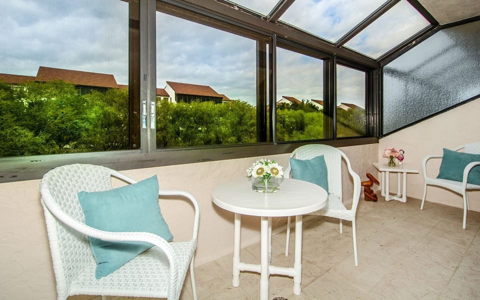 Glassed-in Lanai that opens into a Screened-in Terrace