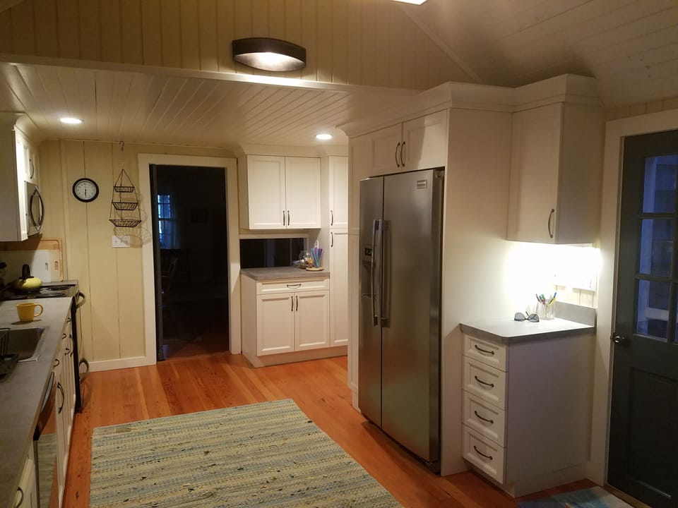 Other view of kitchen with door to dining room