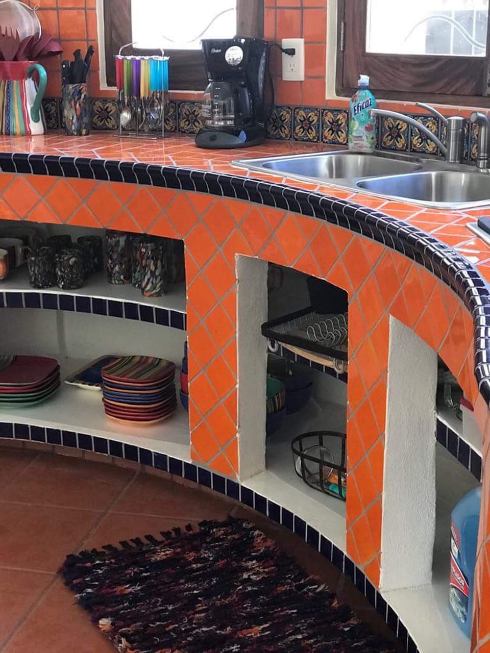 Kitchen area with traditional Mexican tile