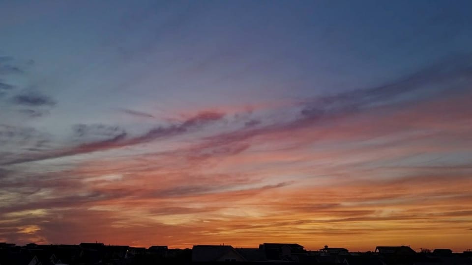 Sunset view toward bay from Master Bedroom porch