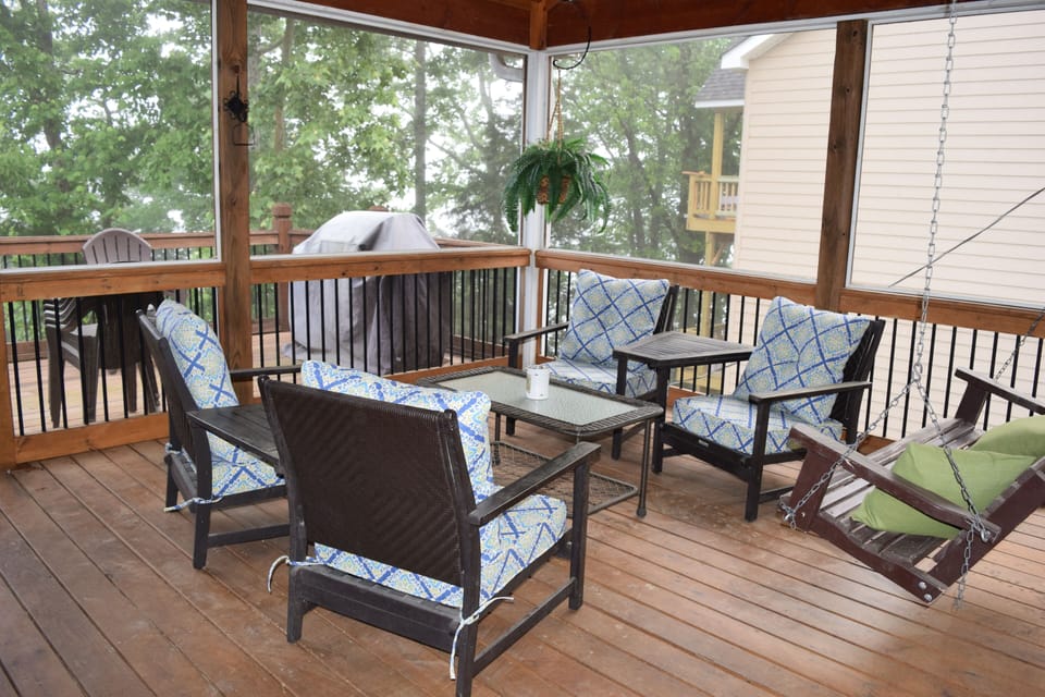 Screened porch with swing