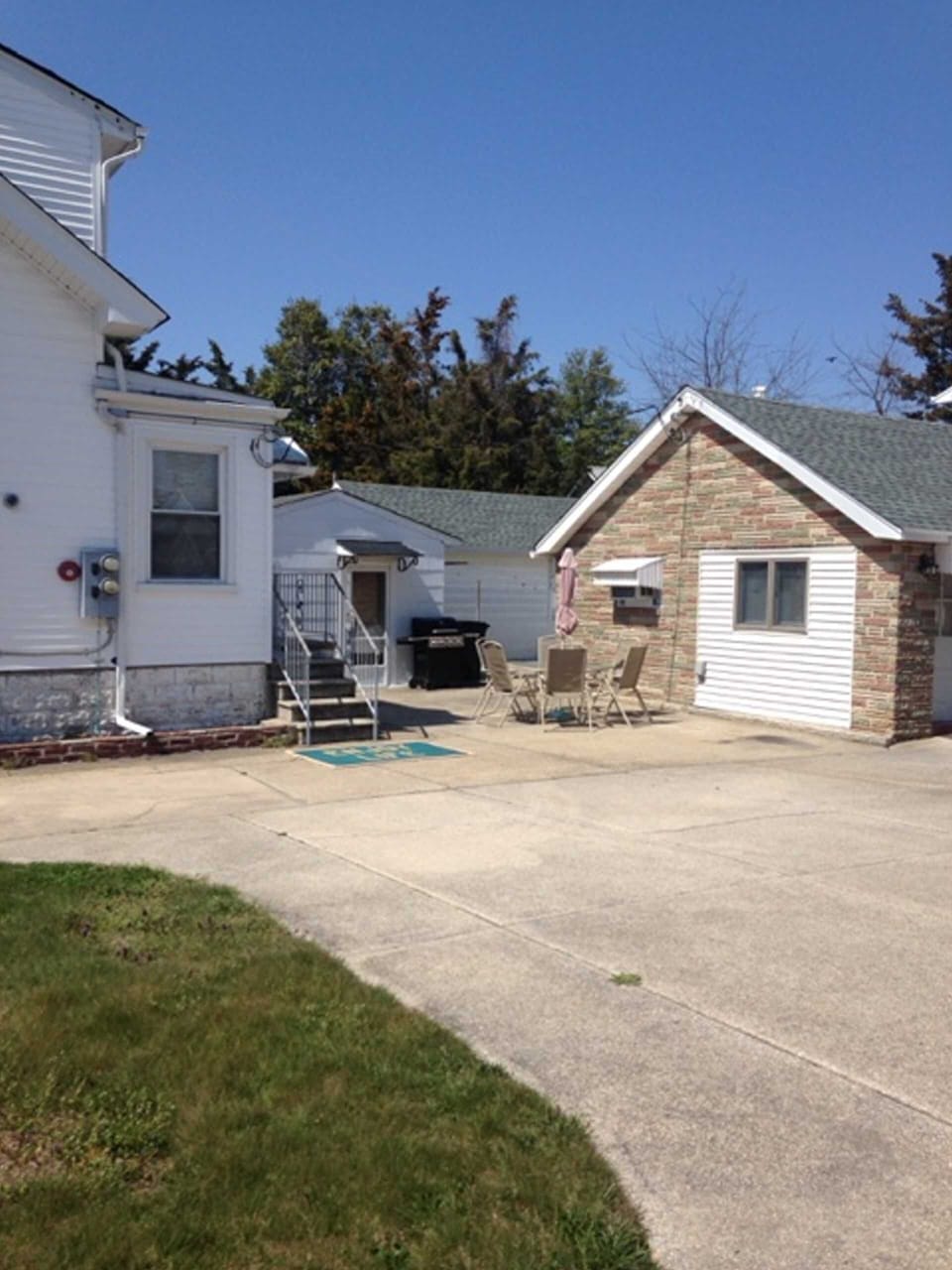back of house 
propane grill & outdoor table