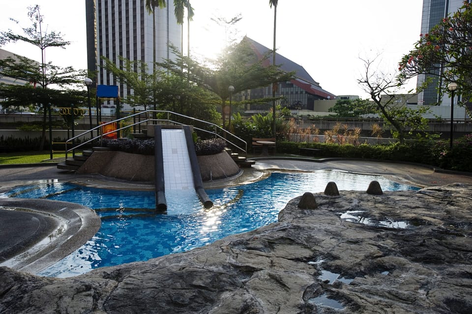 Childrens pool with water slide