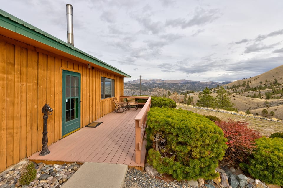 Relax on the front deck in the gliders and take in the beauty