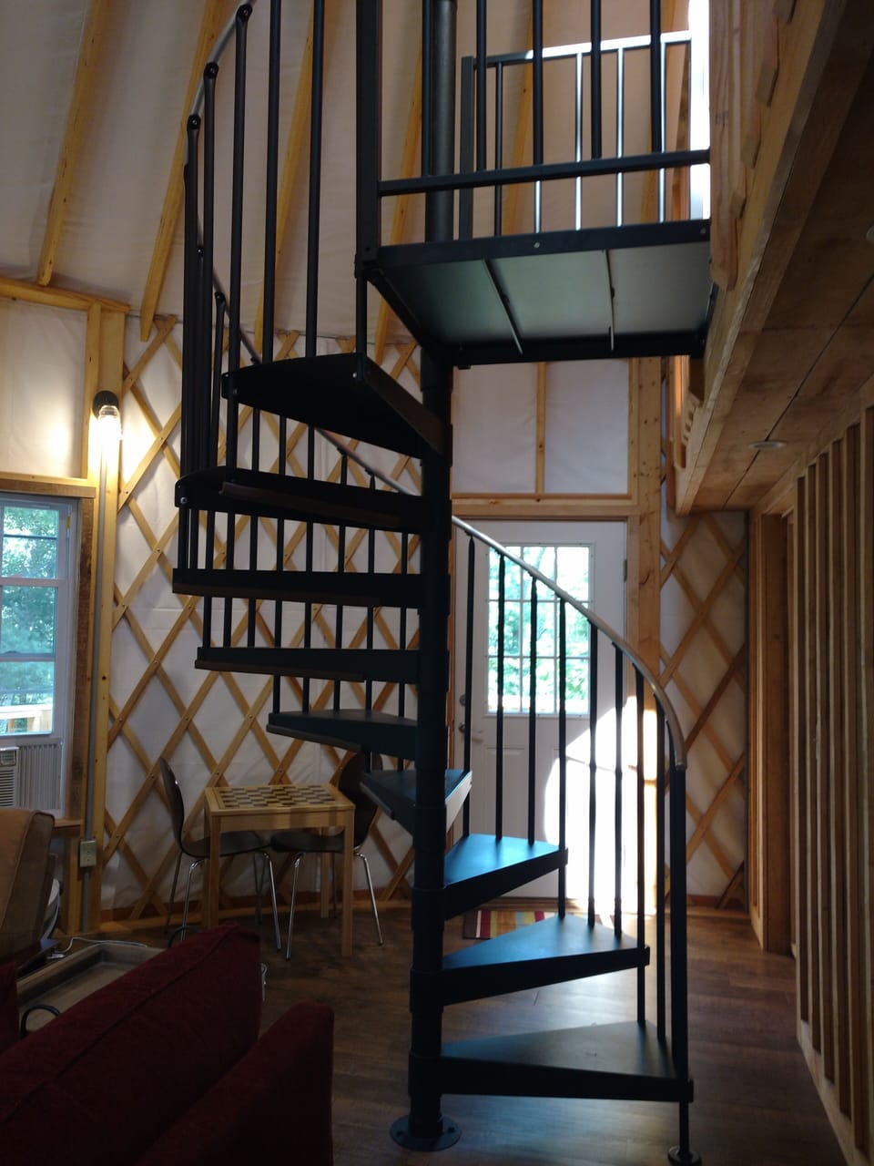 Entry and spiral interior staircase
