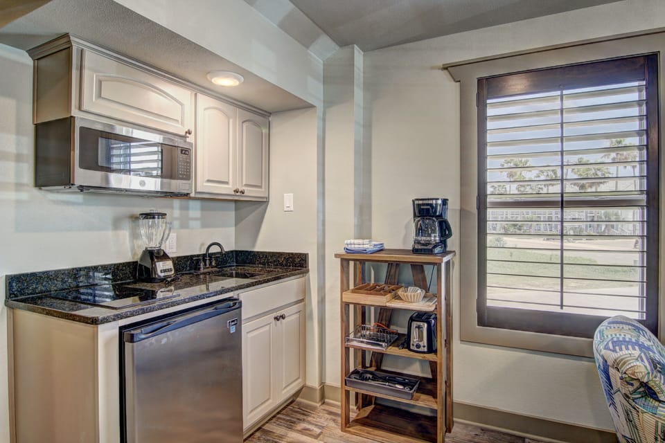 Kitchenette - Kitchenette with 2 burner stovetop, mini fridge and drip coffee maker