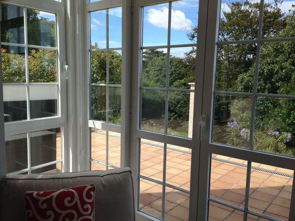 View of terrace and gardens from living room