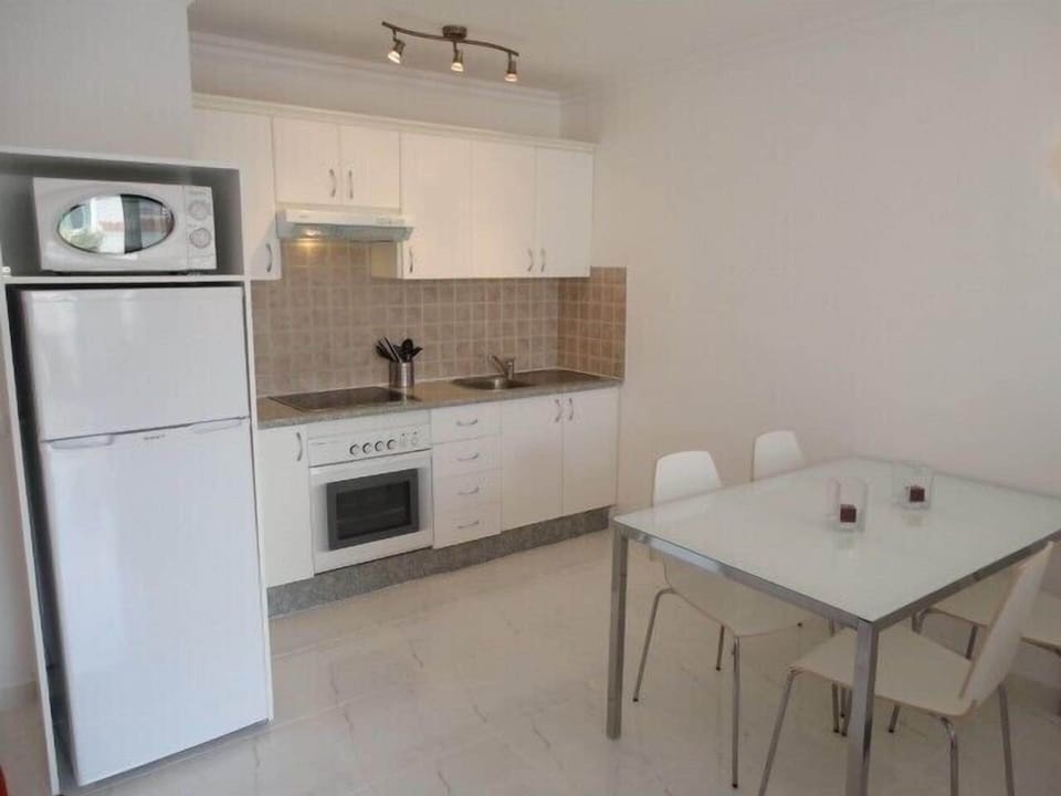 inside, kitchen and dining area