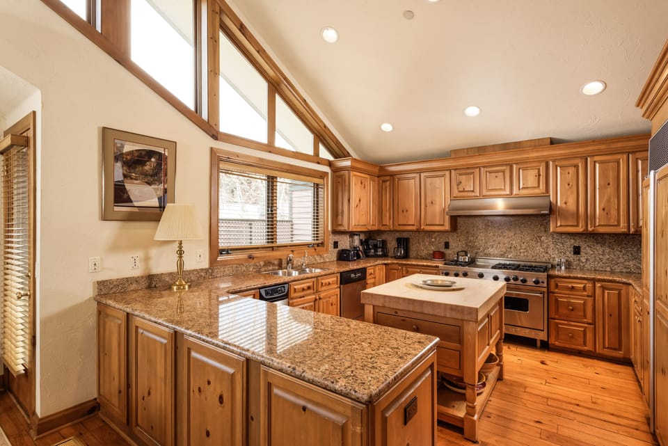 Chef's Kitchen w/center island, Viking Stove and Sub Zero Refrigerator (right)