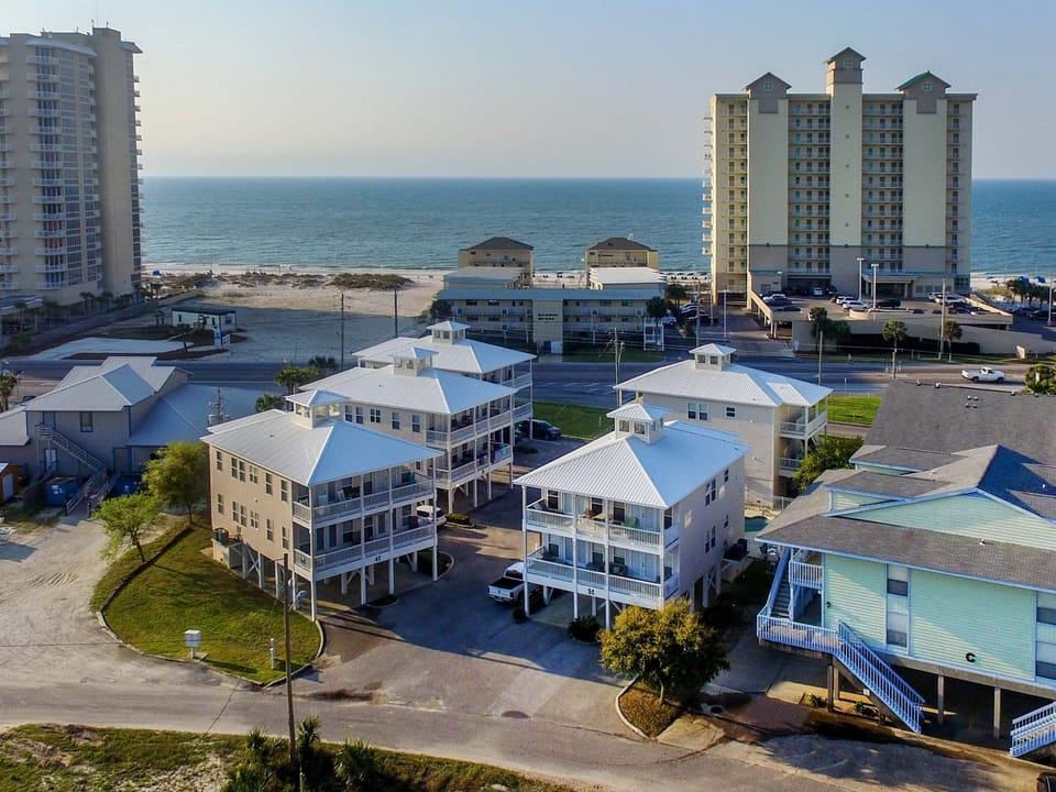 Aerial View of Spinnaker Pointe - Spinnaker Pointe consists of 5 buildings that are over/under duplex units for a total of 10 units in the complex. Access the beach from any of the nearby public beach access points.