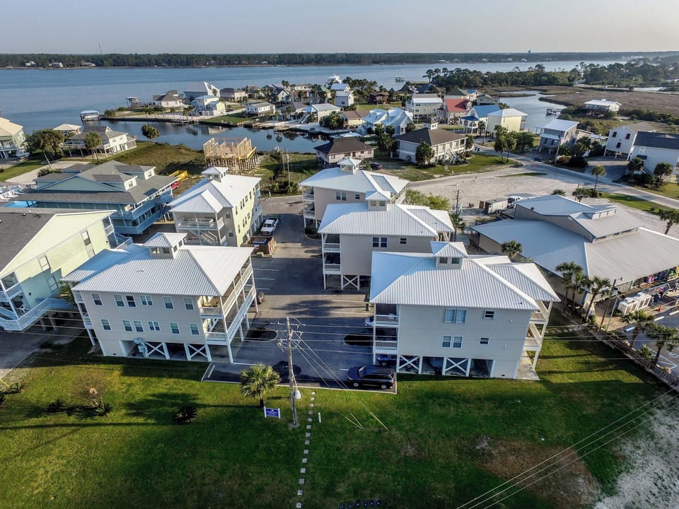 Spinnaker Pointe Complex - The Spinnaker Pointe complex consists of 5 buildings which each feature 2 units, for a total of 10 units. They are close proximity and walking distance to nearby public beach access.