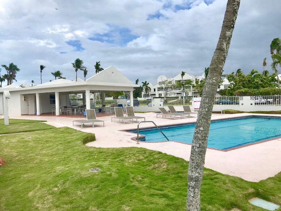 Club house with pool, bathroom, shower, etc.