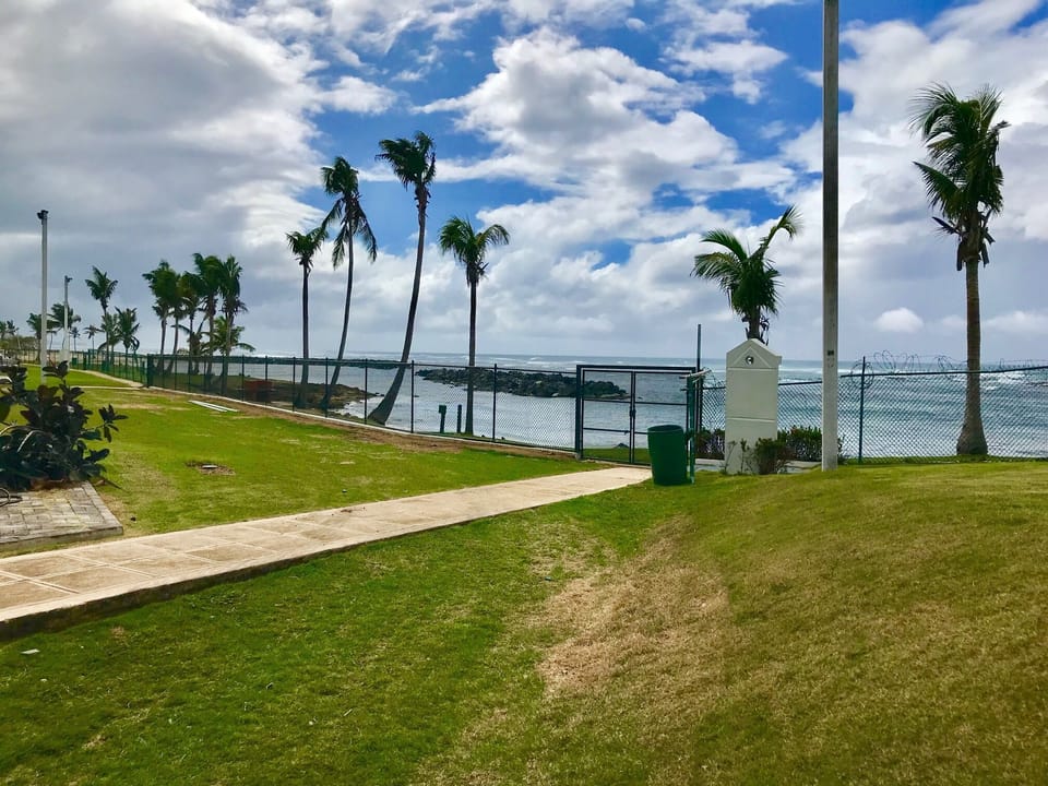 Direct access to private beach and walking adjacent is Embassy Suites resort