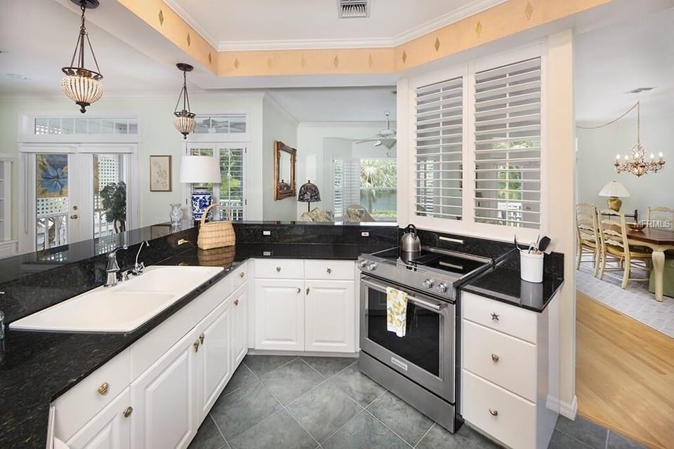 Kitchen with granite counter tops and stainless steel appliances