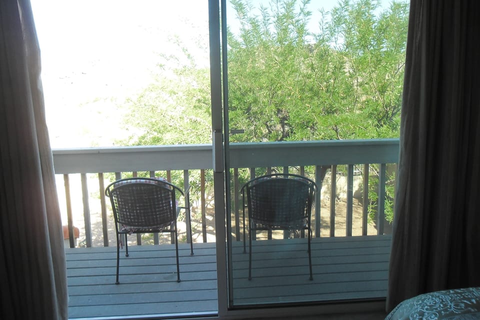 Deck with a mountain view from master bedroom!