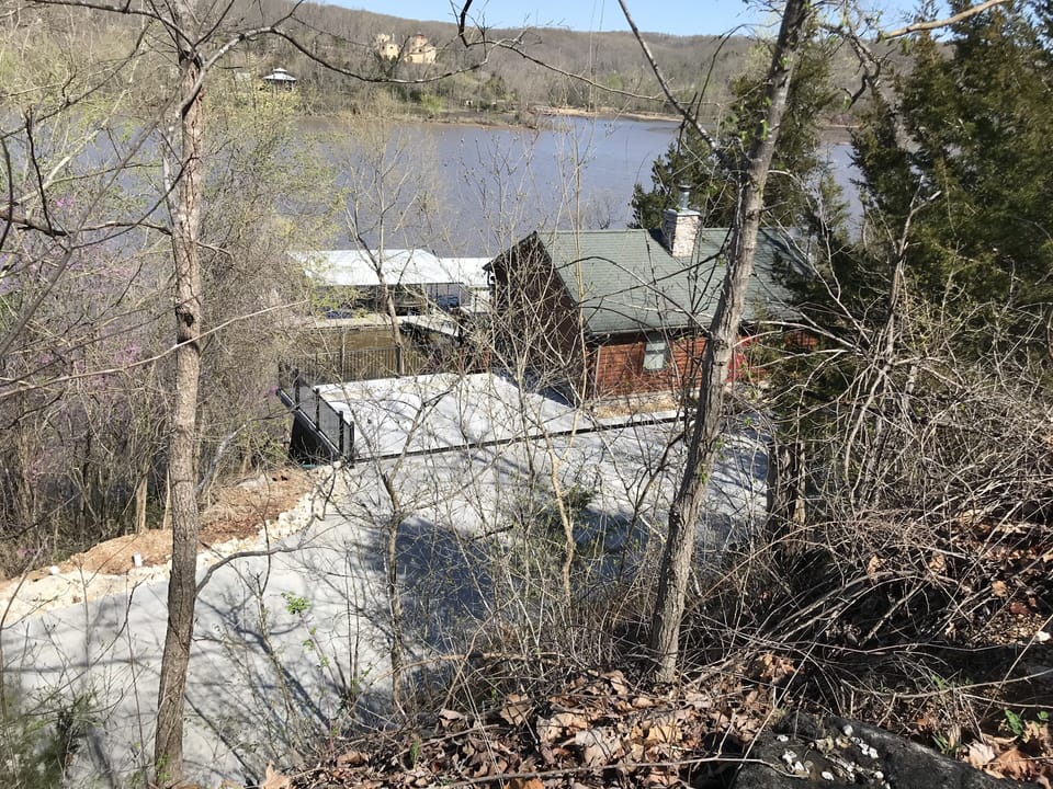 New concrete driveway and parking area 