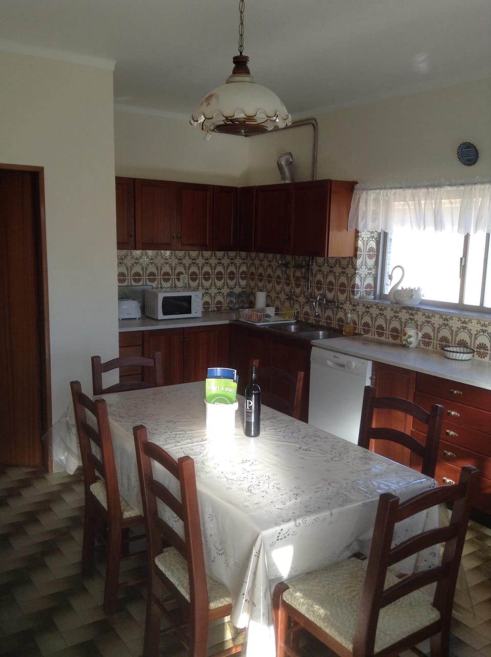 Traditional Portuguese Eat in kitchen, seating for 6. Table expands out as well