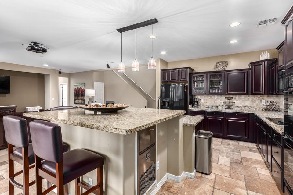 Kitchen with under counter ice machine produces 40 pounds of ice. 