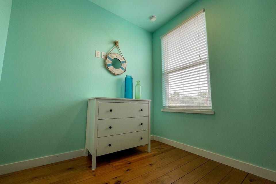 Fourth bedroom is perfect for the kids. Tons of storage in the dresser.
