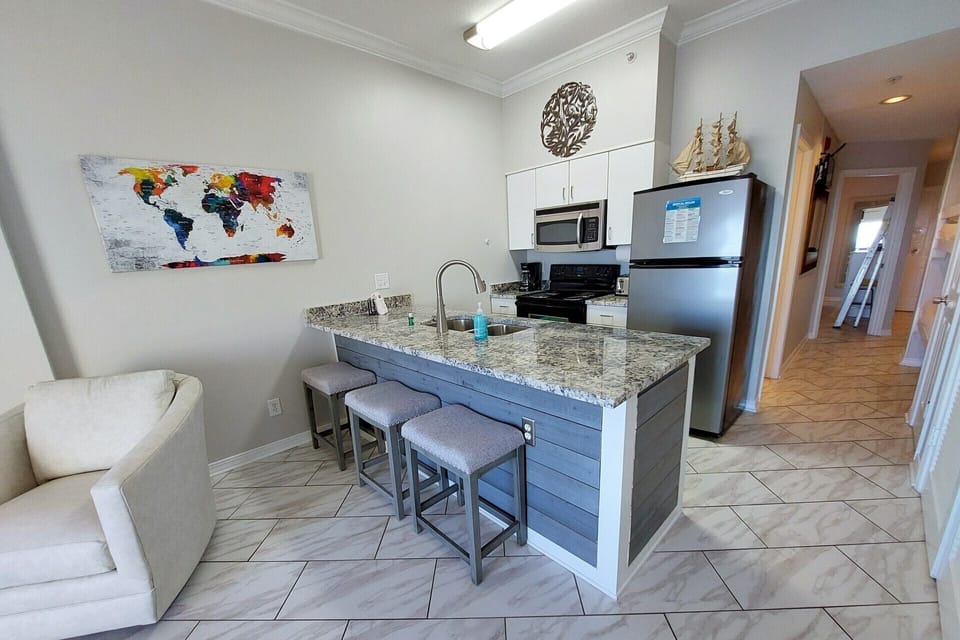 Beautiful granite counters in the kitchen.