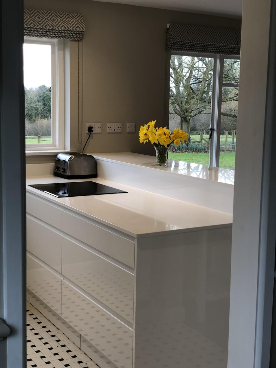Looking into kitchen from utility